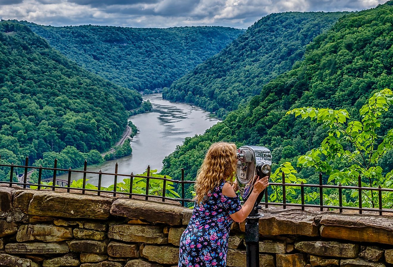 Enjoying the view from Hawks Nest State Park which offers an expansive view of the New River Gorge, West Virginia. Image credit Malachi Jacobs via Shutterstock