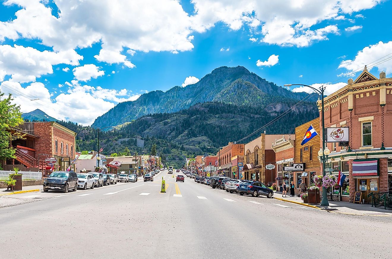 Ouray, USA - August 14, 2019: Small town ski resort mountain village city in Colorado, main street and San Juan mountains, store shops and restaurants