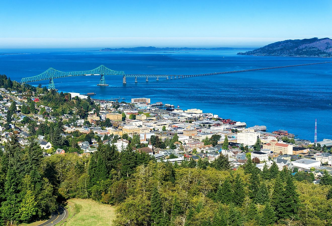 Cityscape view of Astoria, Oregon with the Astoria Megler Bridge and Columbia River.