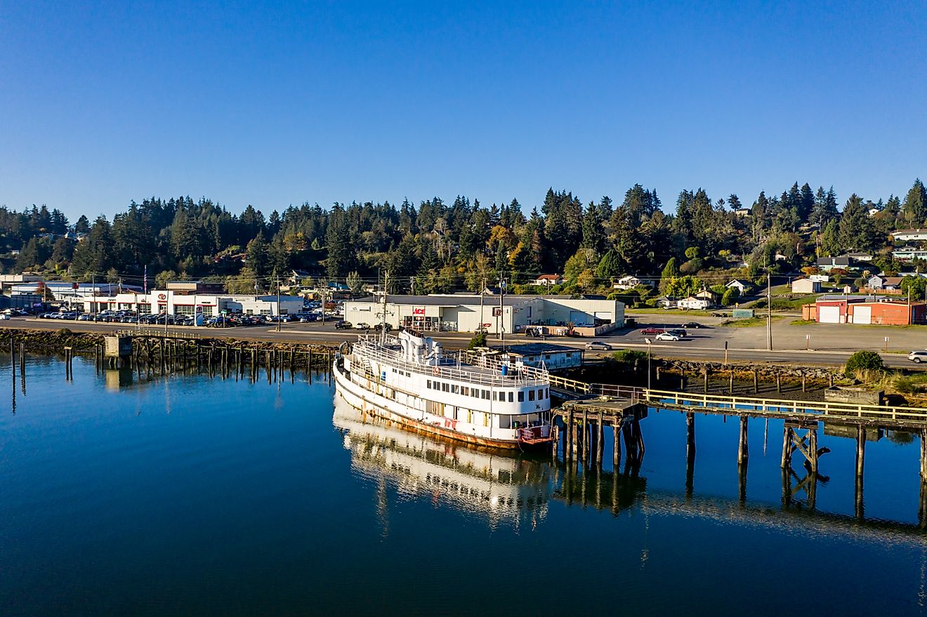 A boat docked along the coast in Coos Bay, Oregon. Editorial credit: Manuela Durson / Shutterstock.com