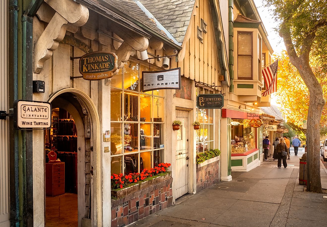 Small boutique stores along the sidewalk in Carmel by the Sea, California. Image credit Robert Mullan via Shutterstock