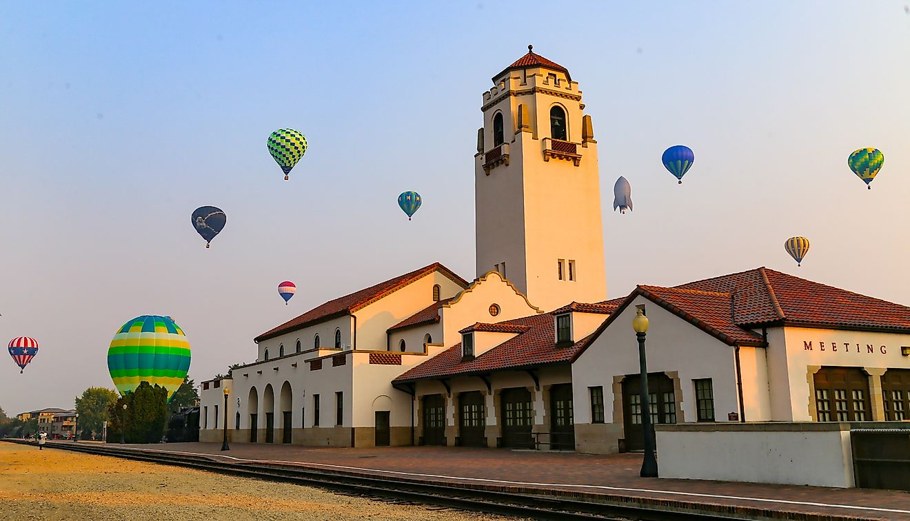 Hot Air Balloons above a historic train station in Idaho 