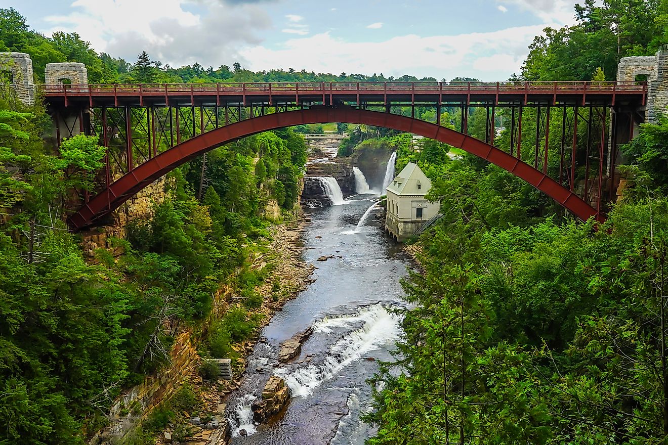 Bridge and Rainbow Falls at Ausable Chasm in Upstate New York. The gorge is about two miles 3.2 km long and is a tourist attraction in the Adirondacks region of Upstate New York.