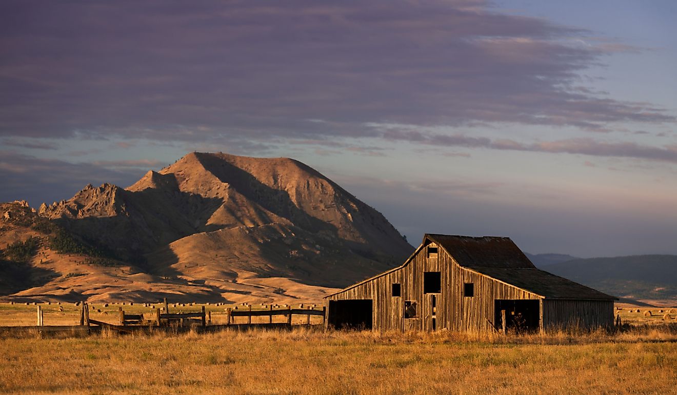 Old barn in front of Bear Butte from Nine Mile Road near Sturgis, South Dakota.