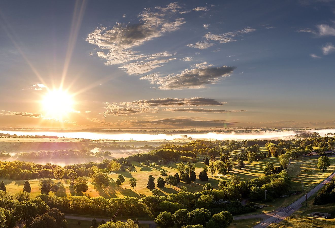 Aerial view of the small town of Mitchell, South Dakota at sunrise. 