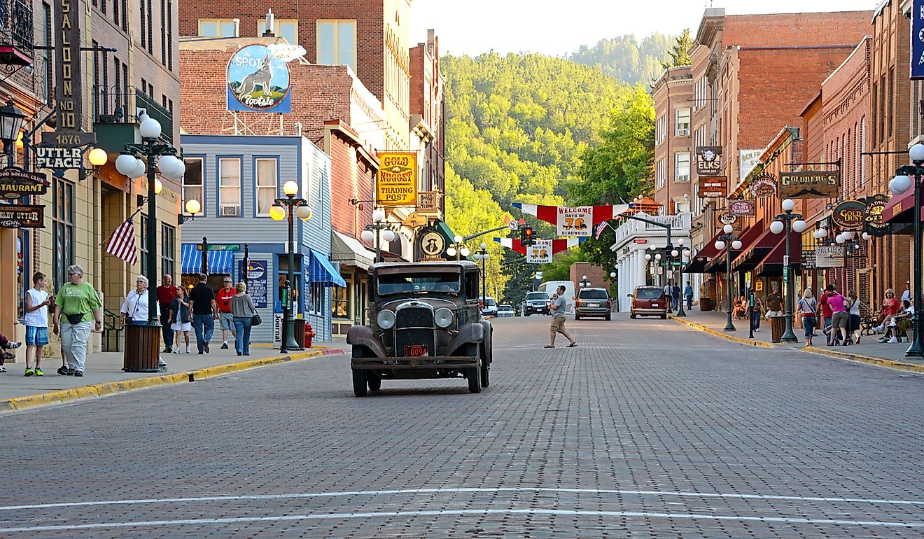 Vintage car approaching on main street in Deadwood. Editorial credit: Michael Kaercher / Shutterstock.com