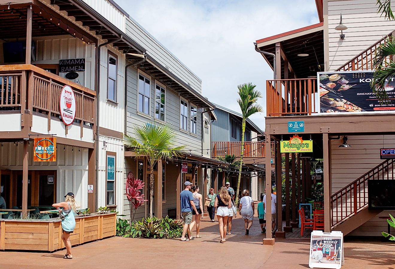 People in downtown Koloa Village, Kauai, Hawaii. Image credit bluestork via Shutterstock