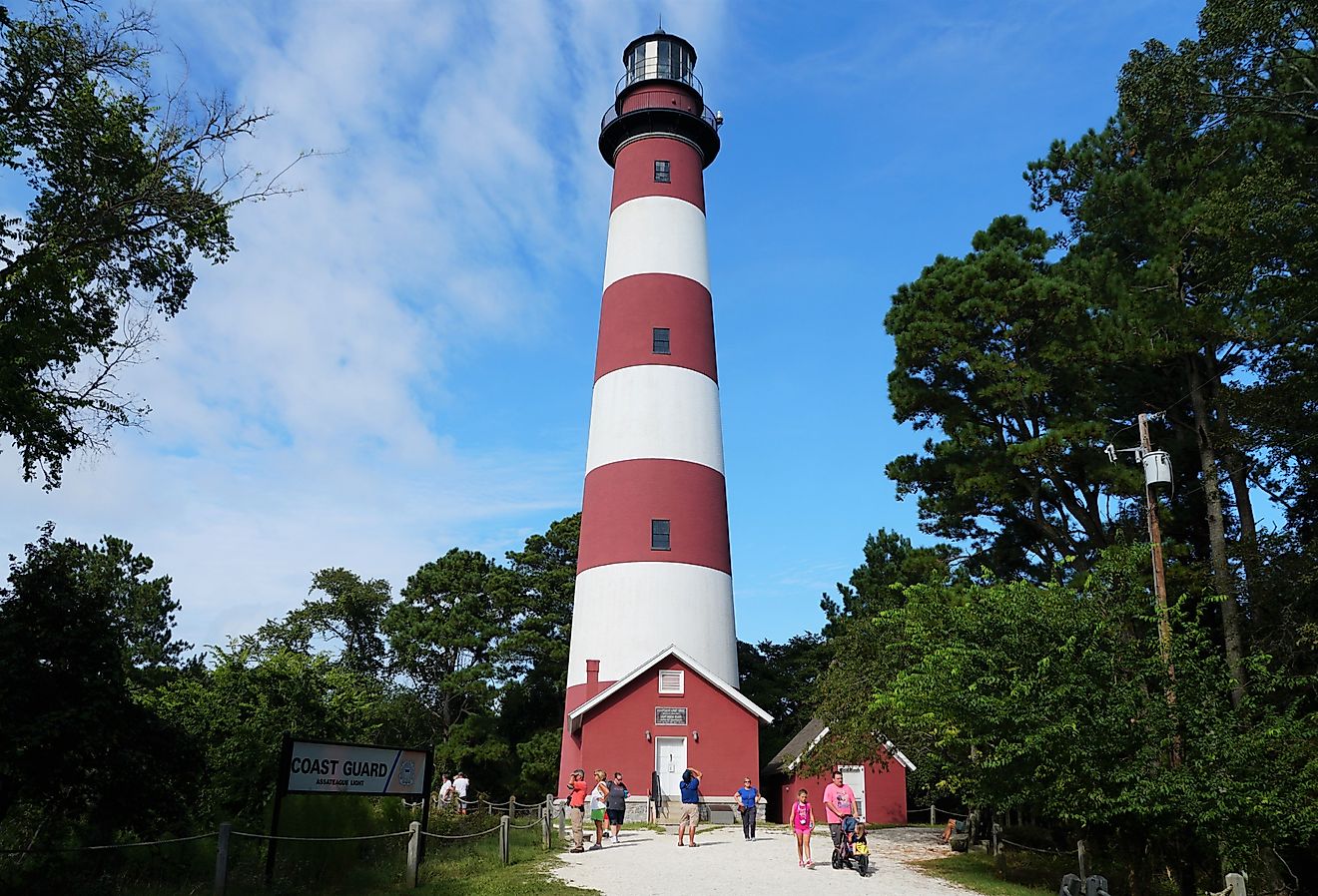 The red and white tower of Assateague Light House, Chincoteague, Virginia. Image credit Khairil Azhar Junos via Shutterstock