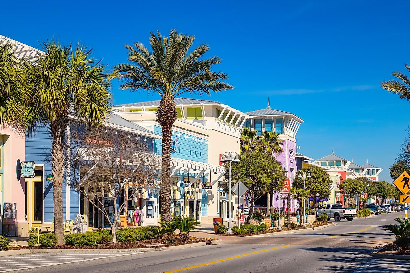 Photo of a street with colorful storefronts in downtown Panama City Beach, Florida