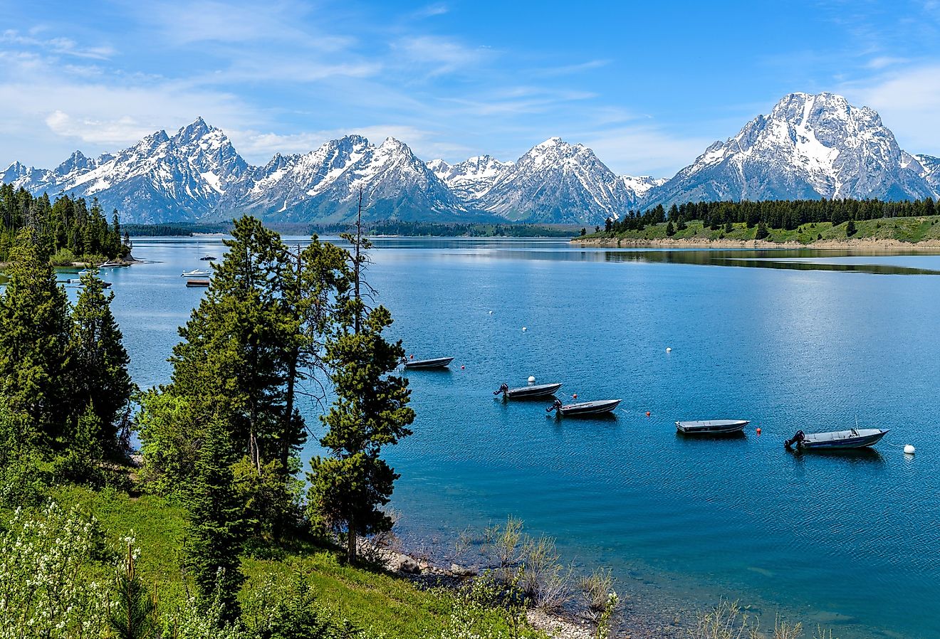 Jackson Lake, spring view of a quiet bay of Jackson Lake, with Teton Range rising in the background, Grand Teton National Park, Wyoming.