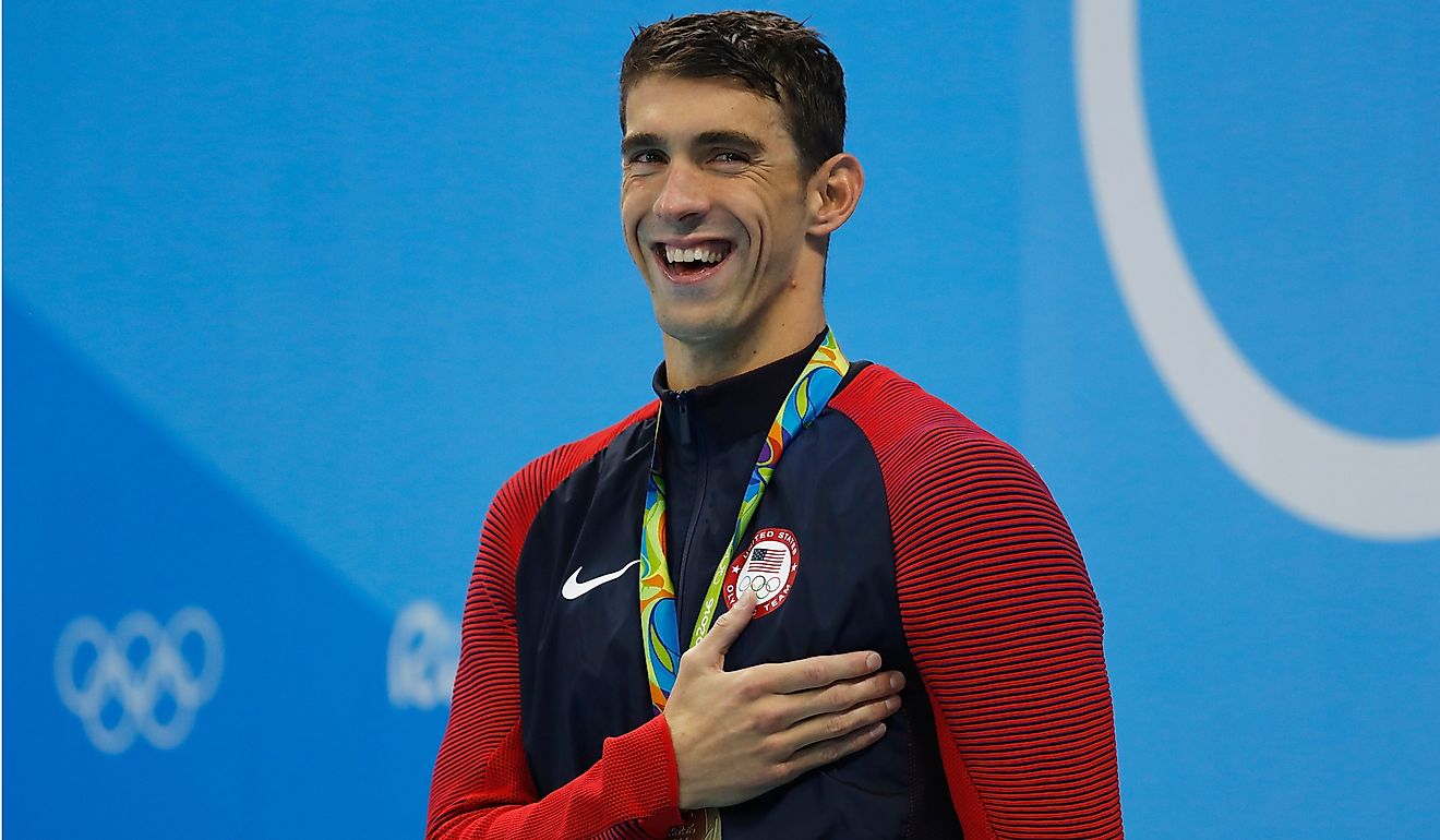 Michael Phelps gold medal at Rio 2016 Olympic Games 200m butterfly swim. Editorial credit: Focus Pix / Shutterstock.com