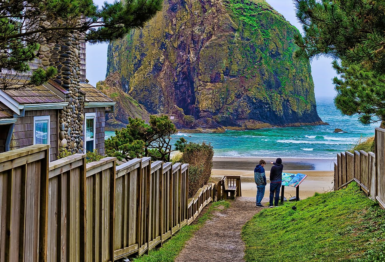 Public beach access path at Cannon Beach, Oregon, with a view of the stunning coastline with Haystack Rock.