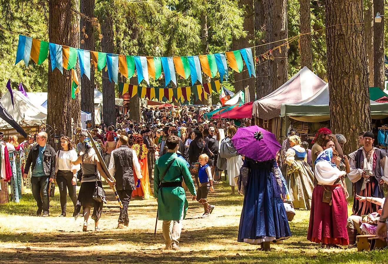 The crowd of people, many dressed in period clothing, at the Oregon Renaissance fair in Canby, Oregon. Image credit Bob Pool via Shutterstock