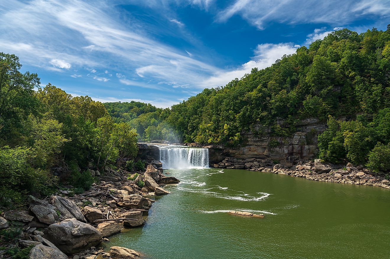 Cumberland Falls with a blue sky with clouds in Corbin, Kentucky.