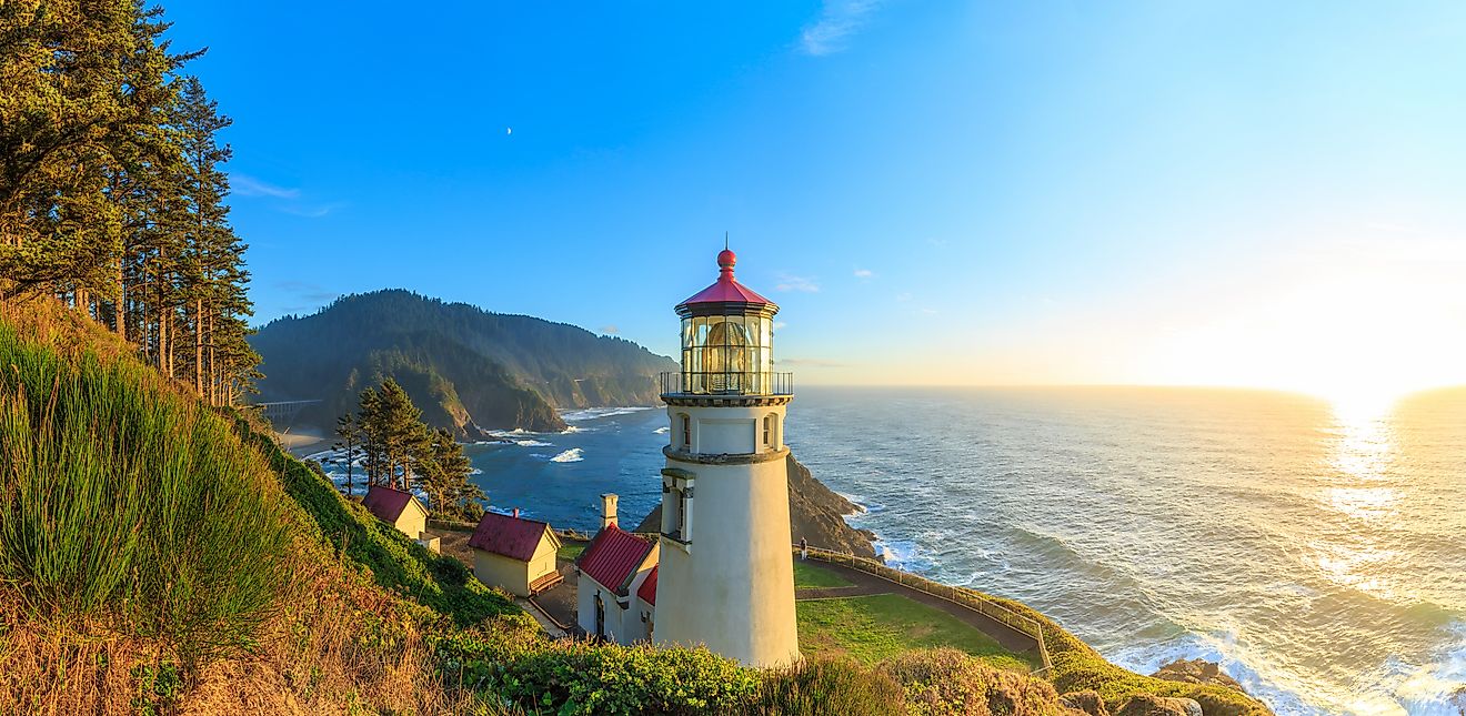 Sunset over the sea illuminating Heceta Head Lighthouse, Oregon, USA