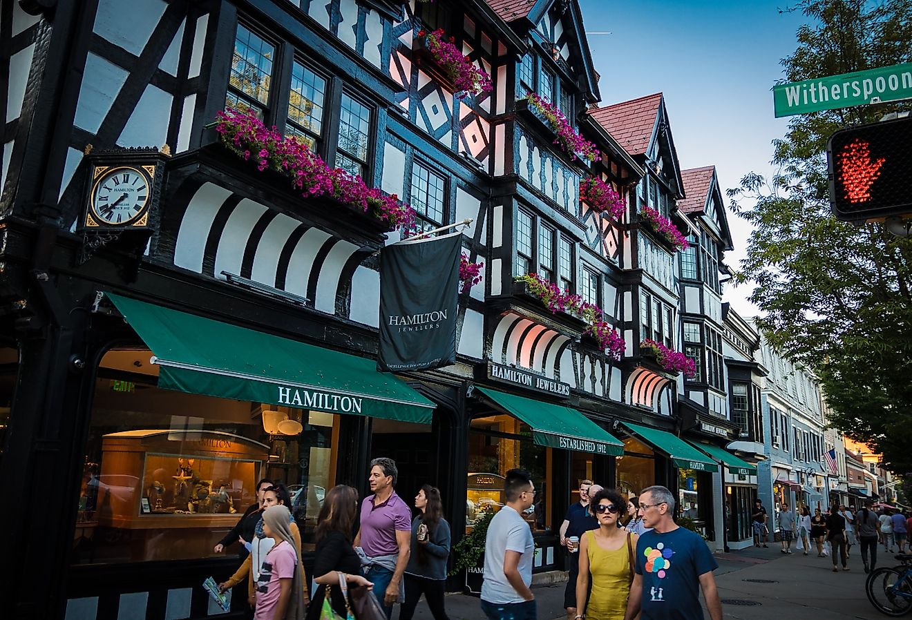 Shoppers and pedestrians near a Tudor-style building on Witherspoon Street in Princeton, New Jersey. Image credit Benjamin Clapp via Shutterstock