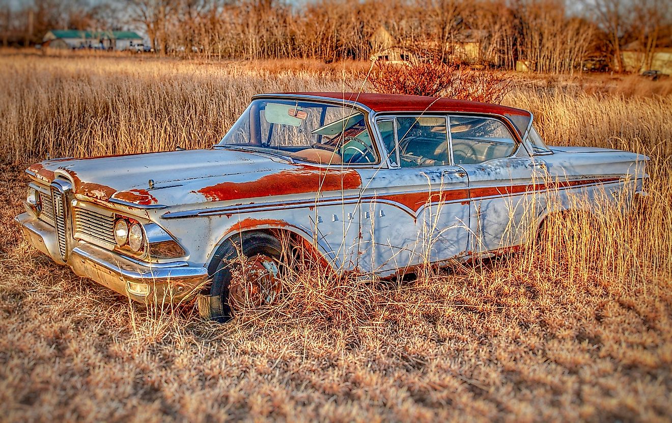 Abandoned classic car in Warsaw, Missouri. Editorial credit: Charles Pittaluga / Shutterstock.com