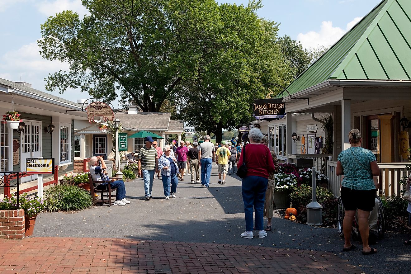 Shoppers browse the storefronts of Kitchen Kettle Village in Bird-In-Hand, PA