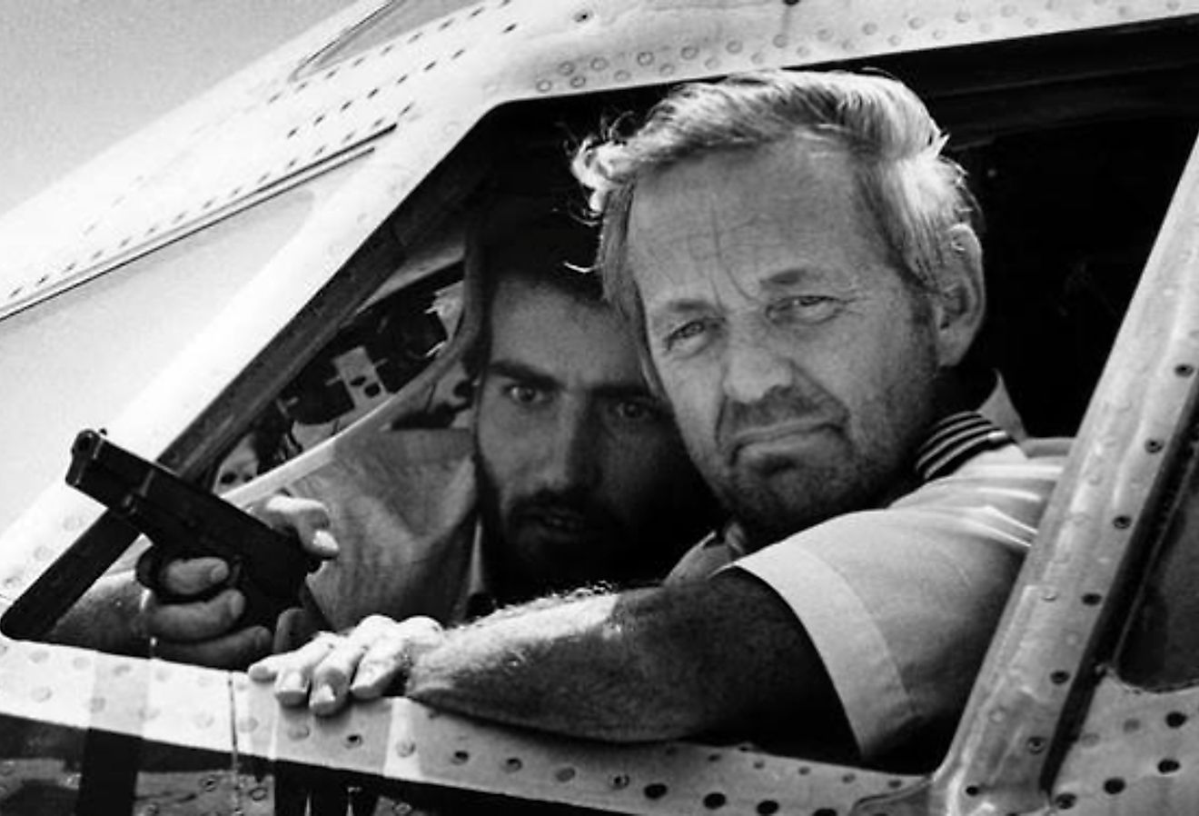 TWA Flight 847 Captain John Testrake with hijacker in Beirut.