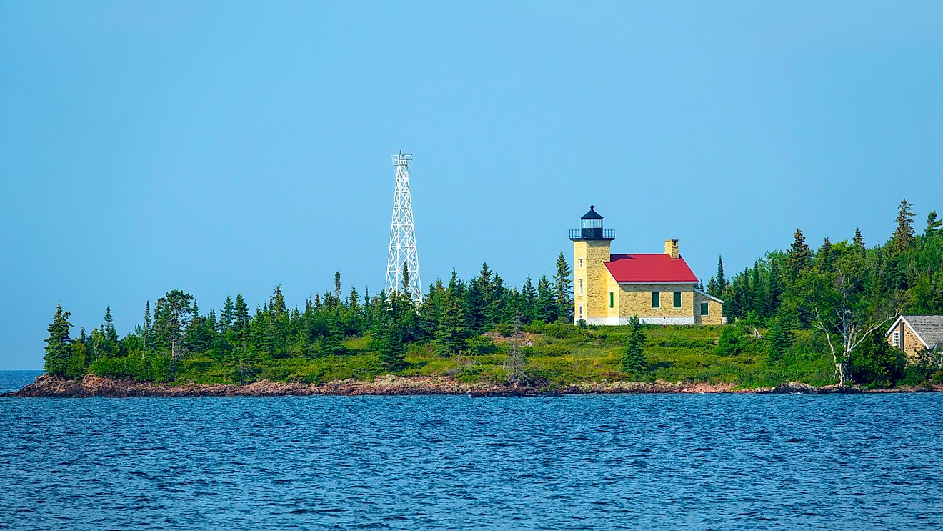 Pictured here: the Copper Harbor Light and a cell phone tower overlooking the deep blue waters of Lake Superior. Copper Harbor, Mci 