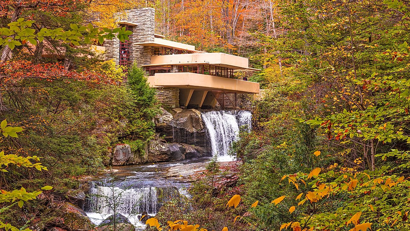 Fallingwater, the iconic house designed by Frank Lloyd Wright, perched over Bear Run waterfall in Mill Run, Pennsylvania. Editorial credit: Sean Pavone / Shutterstock.com