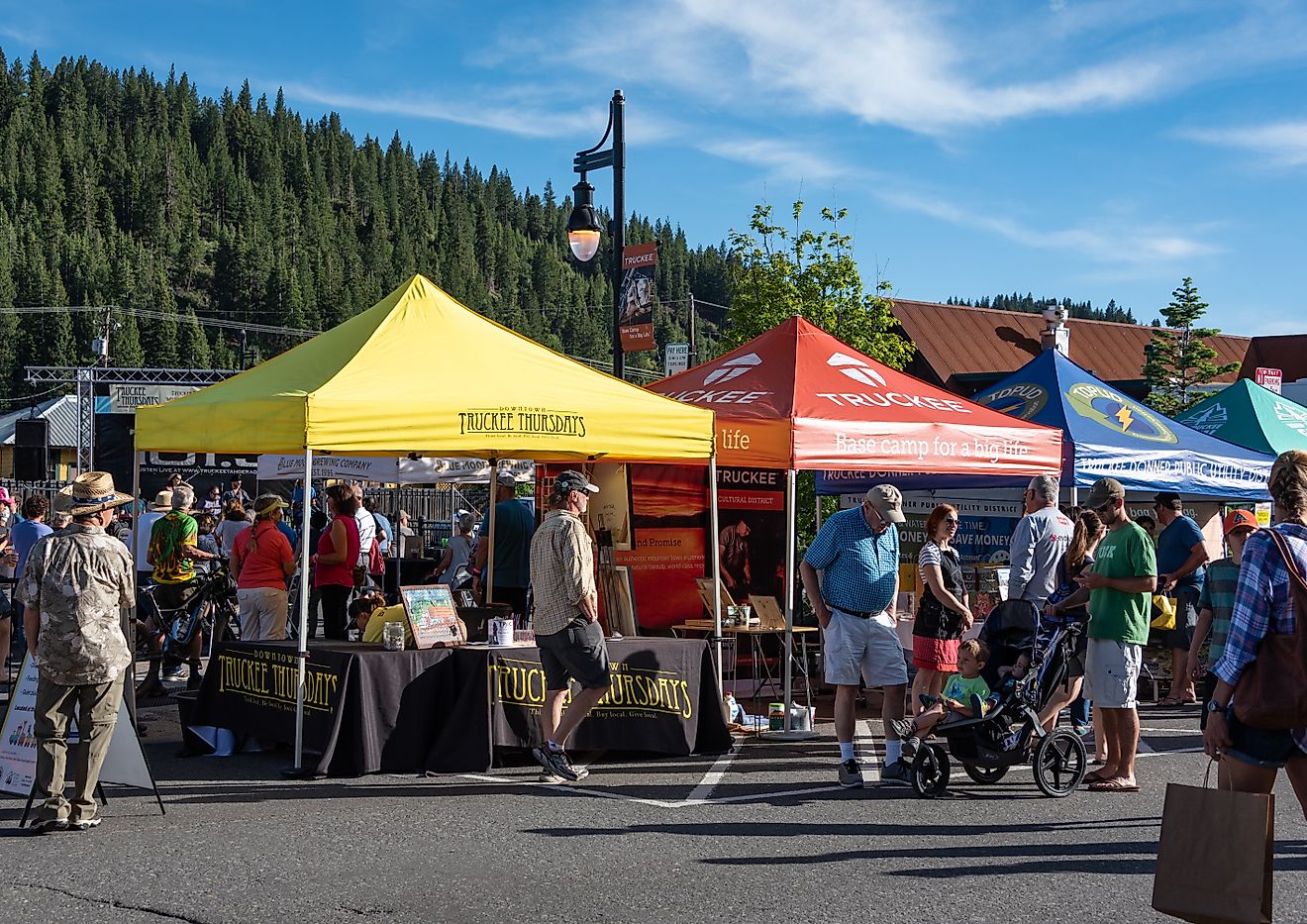 A photo of visitors and various vendors at "Truckee Thursdays," a weekly summer event in Truckee, California, by Chris Allan / Shutterstock.com