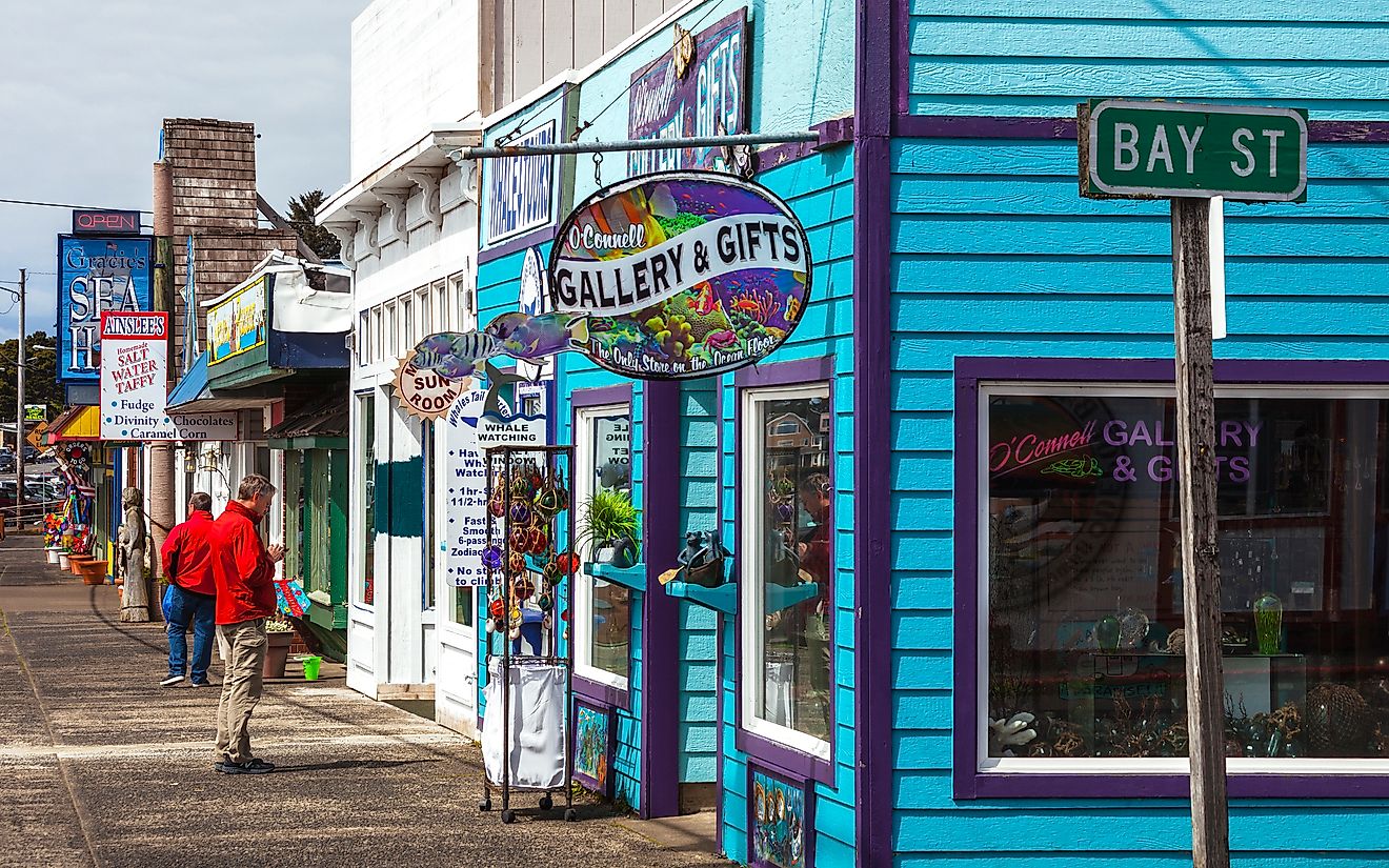 Depoe Bay, Oregon, USA - Colorful shops at main street of small coastal town, via peeterv / iStock.com