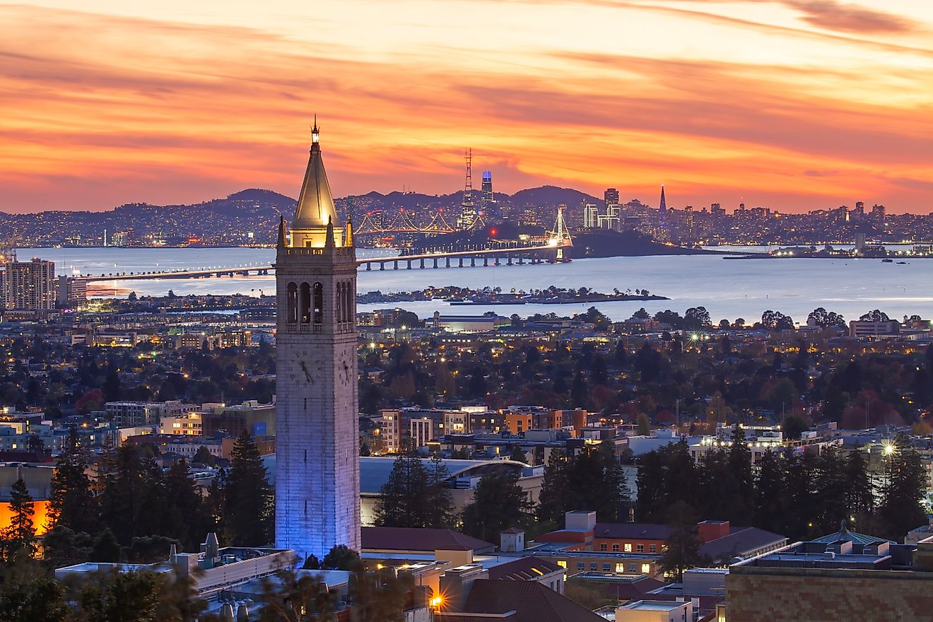 Sather Tower in UC Berkeley and San Francisco City Skyline at Sunset