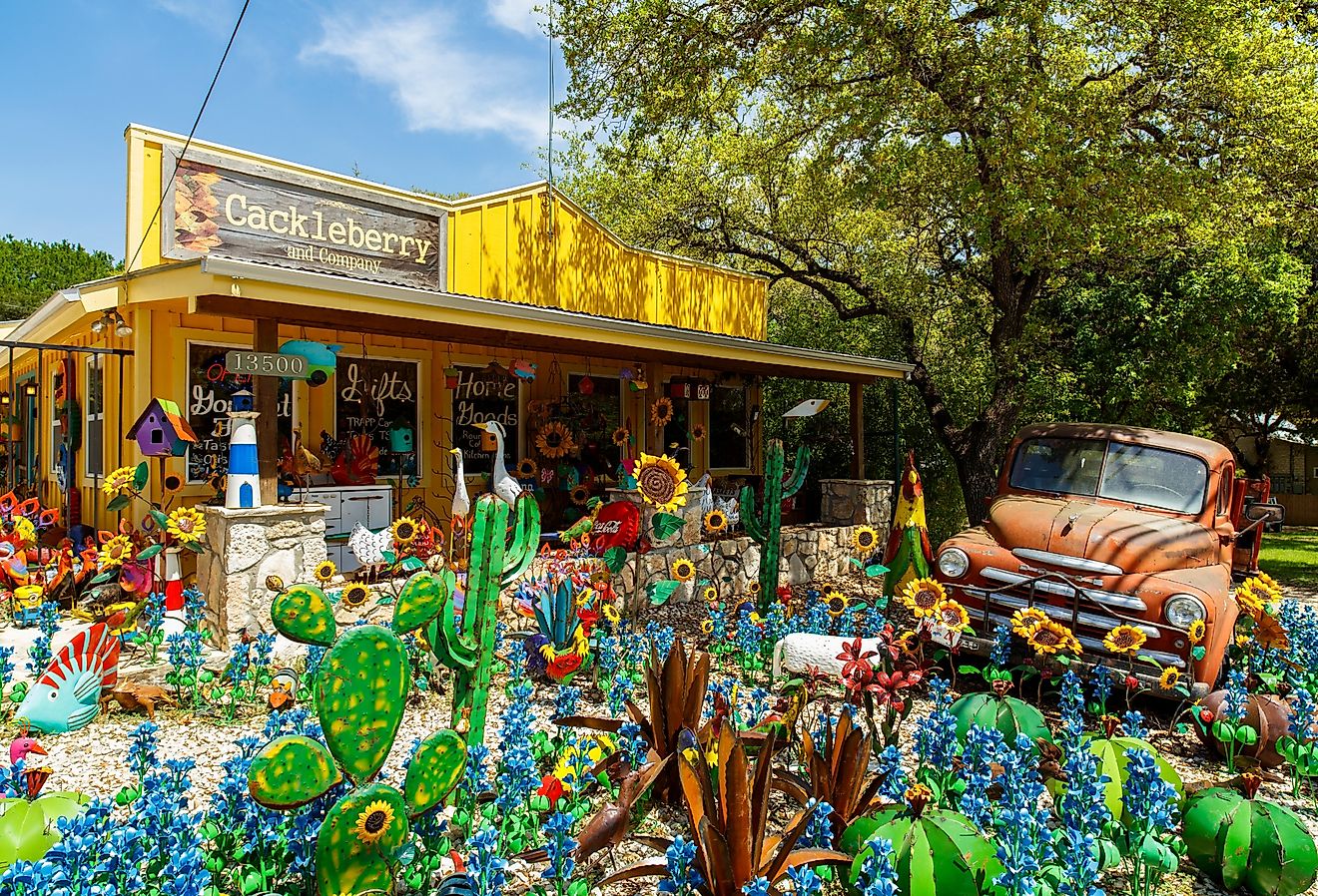 Colorful shop with artwork on display in the small Texas Hill Country town of Wimberley, Texas.