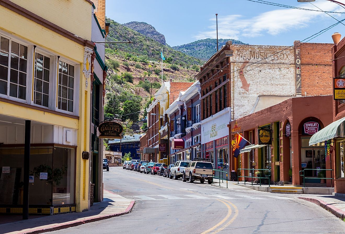 Main St store fronts in downtown Bisbee, Arizona in the summer. Image credit D.J. Wednesday via Shutterstock