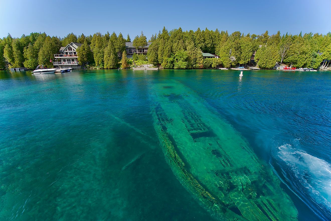 A sunken schooner called "The Sweepstakes" sits at the bottom of Big Tub Harbour in Tobermory, Ontario (part of Fathom Five Marine National Park).