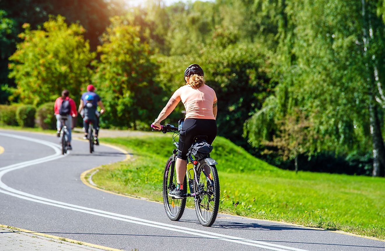 Cyclist ride on the bike path in the city Park