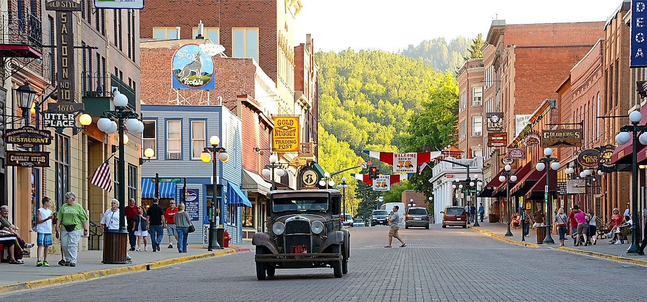 Vintage car approaching on Main Street in Deadwood, South Dakota. Editorial credit: Michael Kaercher / Shutterstock.com
