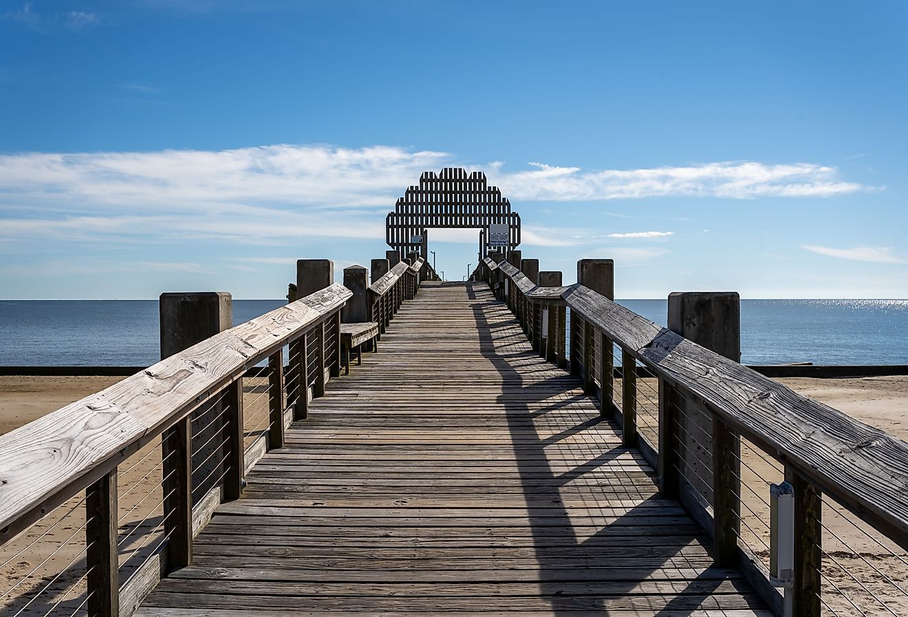 Wooden bridge on the beach in Pascagoula, Mississippi. Image credit Engi Caribe via Shutterstock.