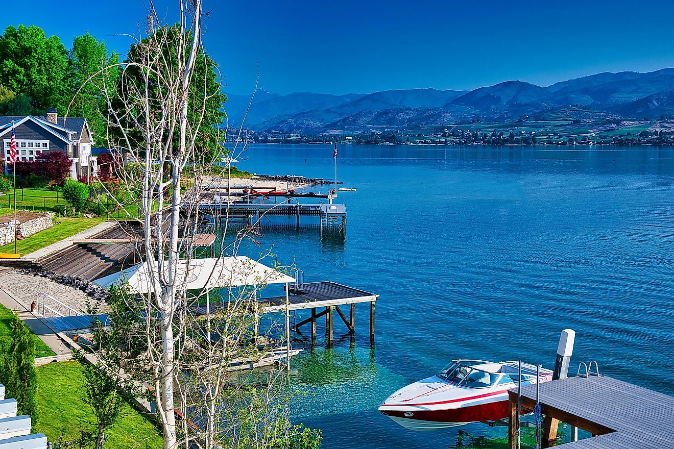 Boats docked along the shores of Lake Chelan in Washington.