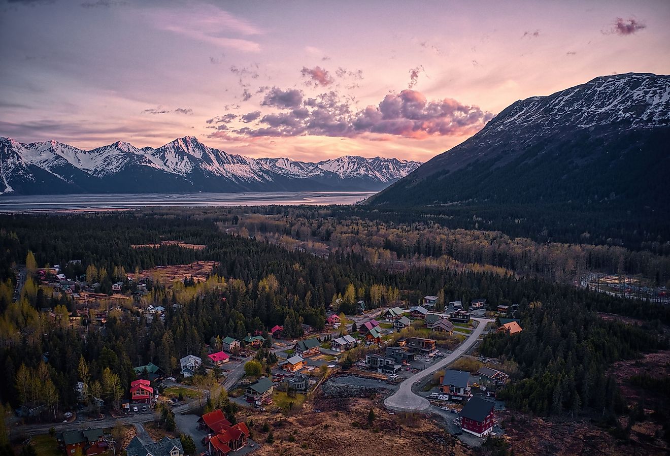 Aerial view of the resort town of Girdwood, Alaska, at sunset.