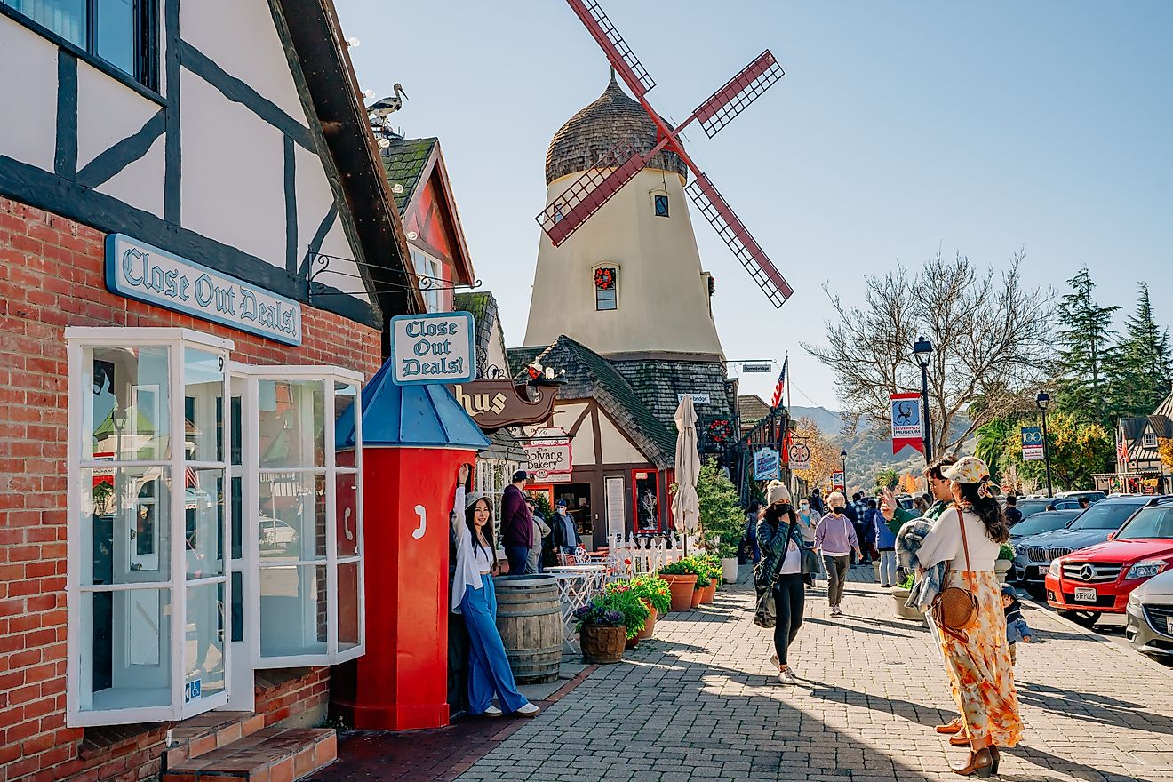 Windmill and Tower Pizza on Main Street in Solvang, California, USA. Featuring traditional Danish-style architecture, offering a glimpse of "little Denmark" in California. Editorial credit: HannaTor / Shutterstock.com