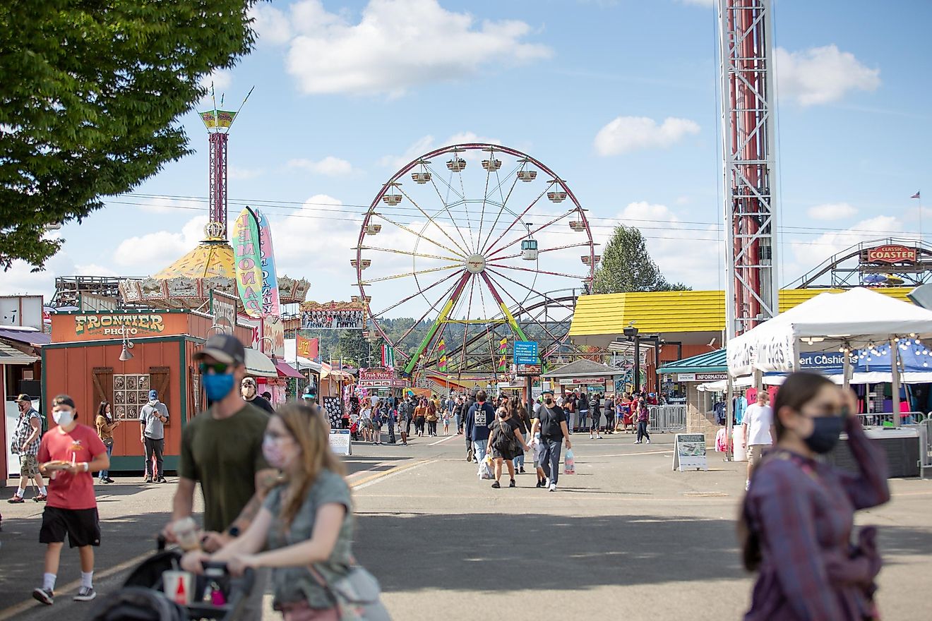 A view of a crowd enjoying the experience of the Washington State Fair in Puyallup, Washington. Editorial credit: The Image Party / Shutterstock.com