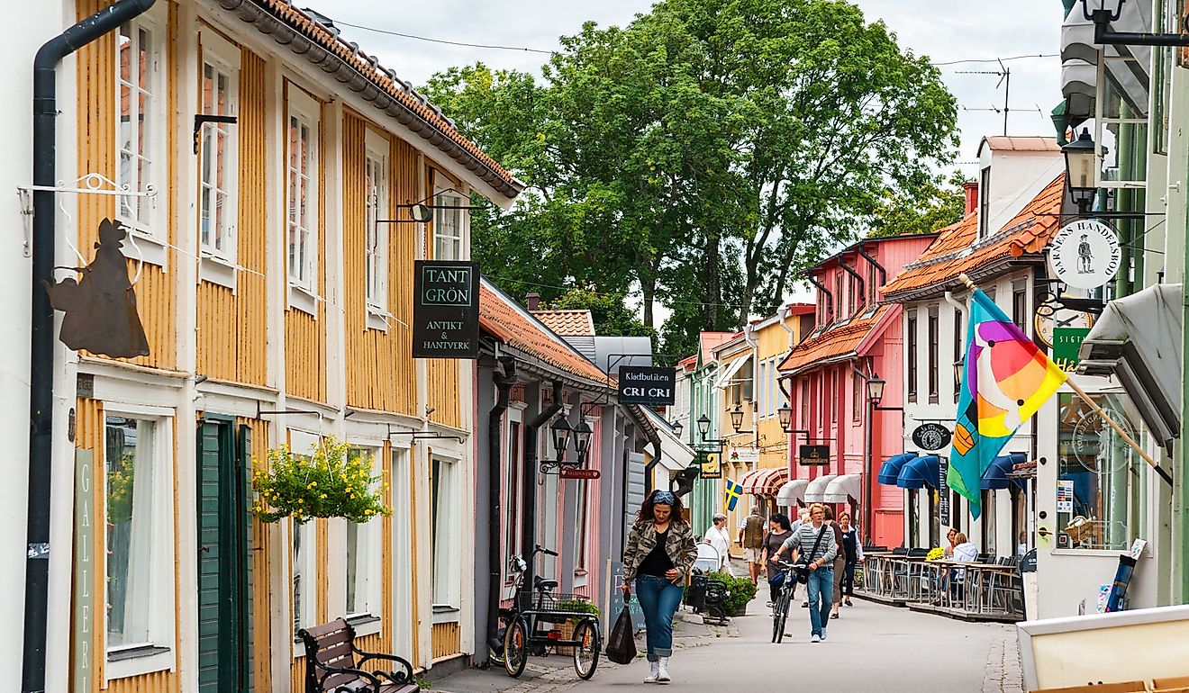 Traditional wooden houses on Stora Gatan street in heart of Sigtuna, Sweden. Editorial credit: Andrei Nekrassov / Shutterstock.com