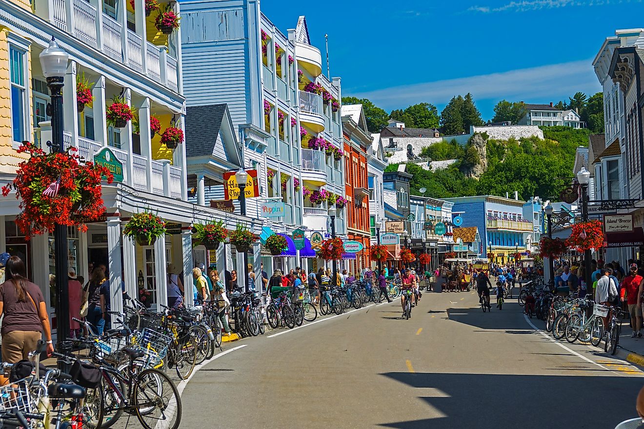 Crowded street view of Mackinac Island, Michigan, during the busy tourist season. Editorial credit: Dennis MacDonald / Shutterstock.com