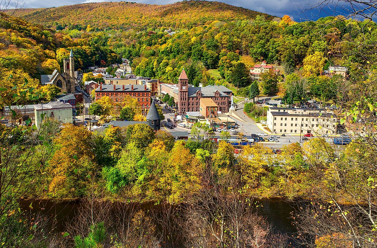 Aerial view of Jim Thorpe, Pennsylvania and surrounding Poconos Mountains during autumn.