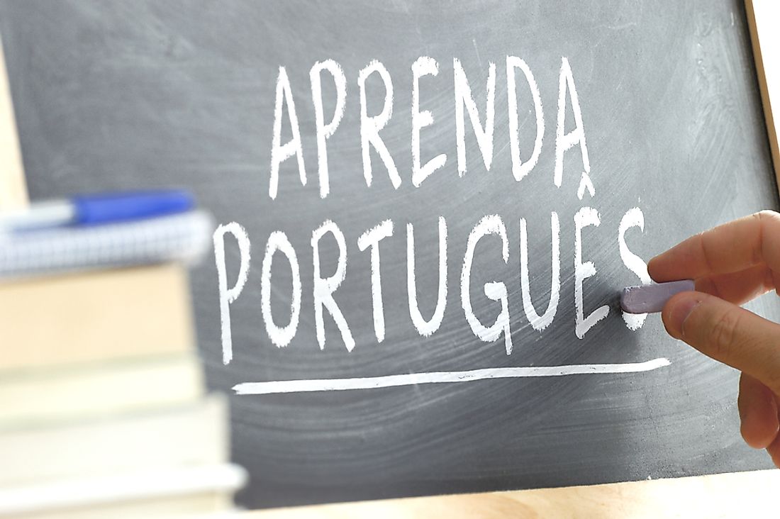 A chalkboard with the words "learn Portuguese" written. 