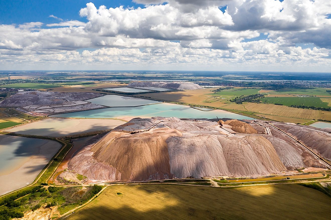 Mountains of potash salt products and artificial reservoirs near the city of Soligorsk, Belarus.