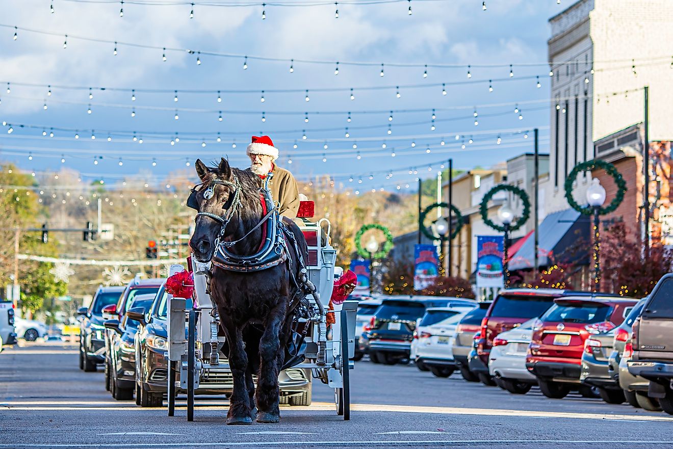 Horse-drawn carriage traveling on Main Street in beautiful Prattville, Alabama. Editorial credit: JNix / Shutterstock.com.