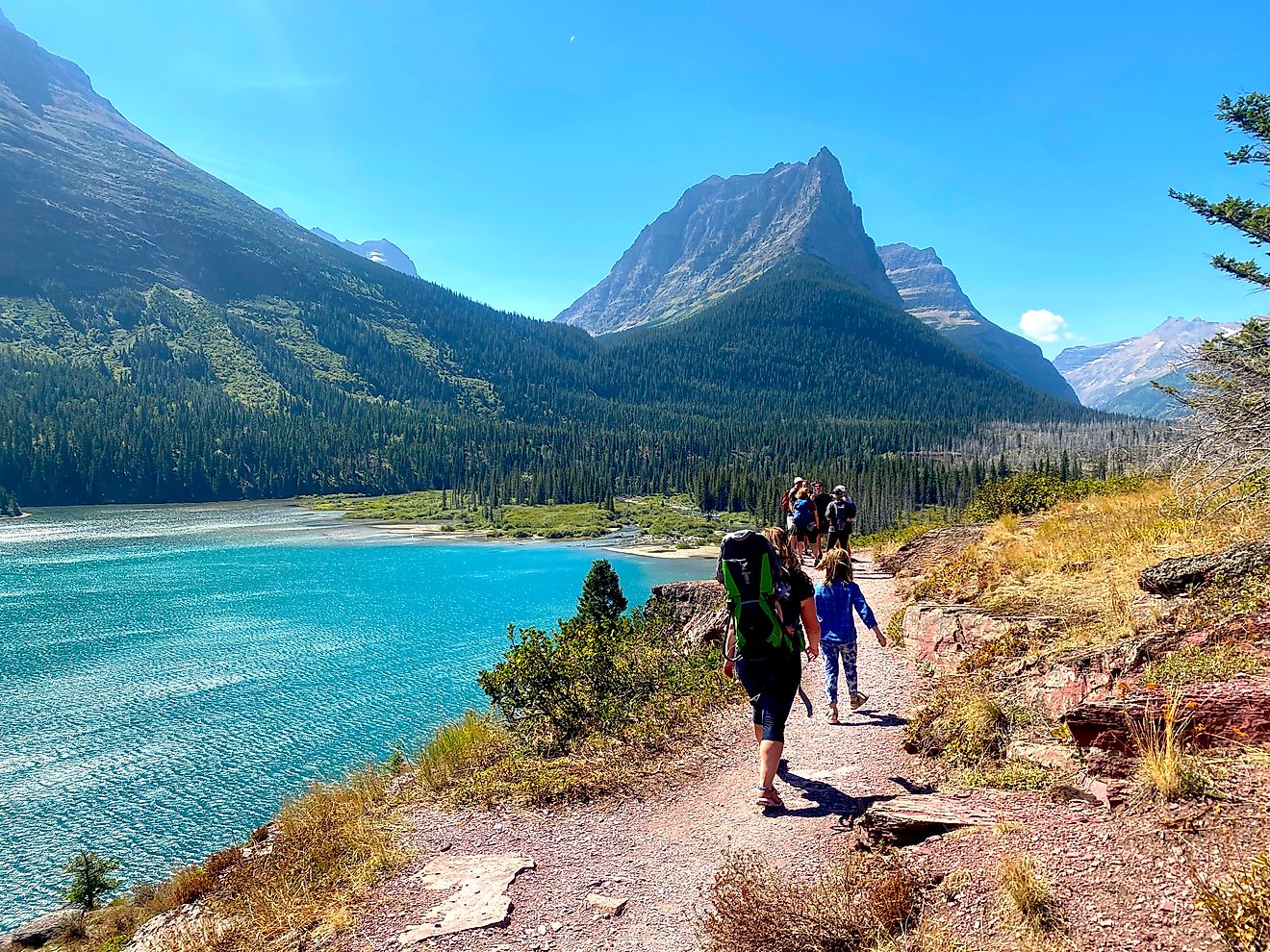 Visitors hiking in the Glacier National Park, Montana.