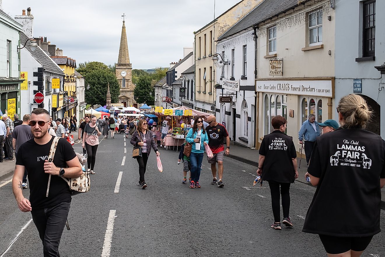 Ould Lammas Fair, busy streets and stalls selling traditional goods in Ballycastle, Northern Ireland. Editorial credit: Steve Nimmons / Shutterstock.com