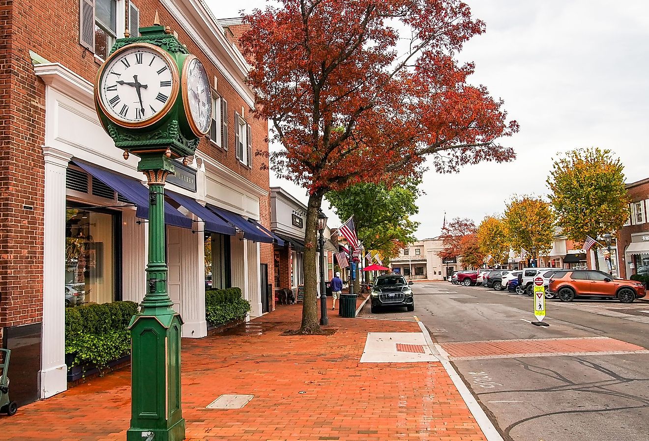 New Canaan view from Elm Street in autumn morning with colored trees in October. Image credit Miro Vrlik Photography via Shutterstock.