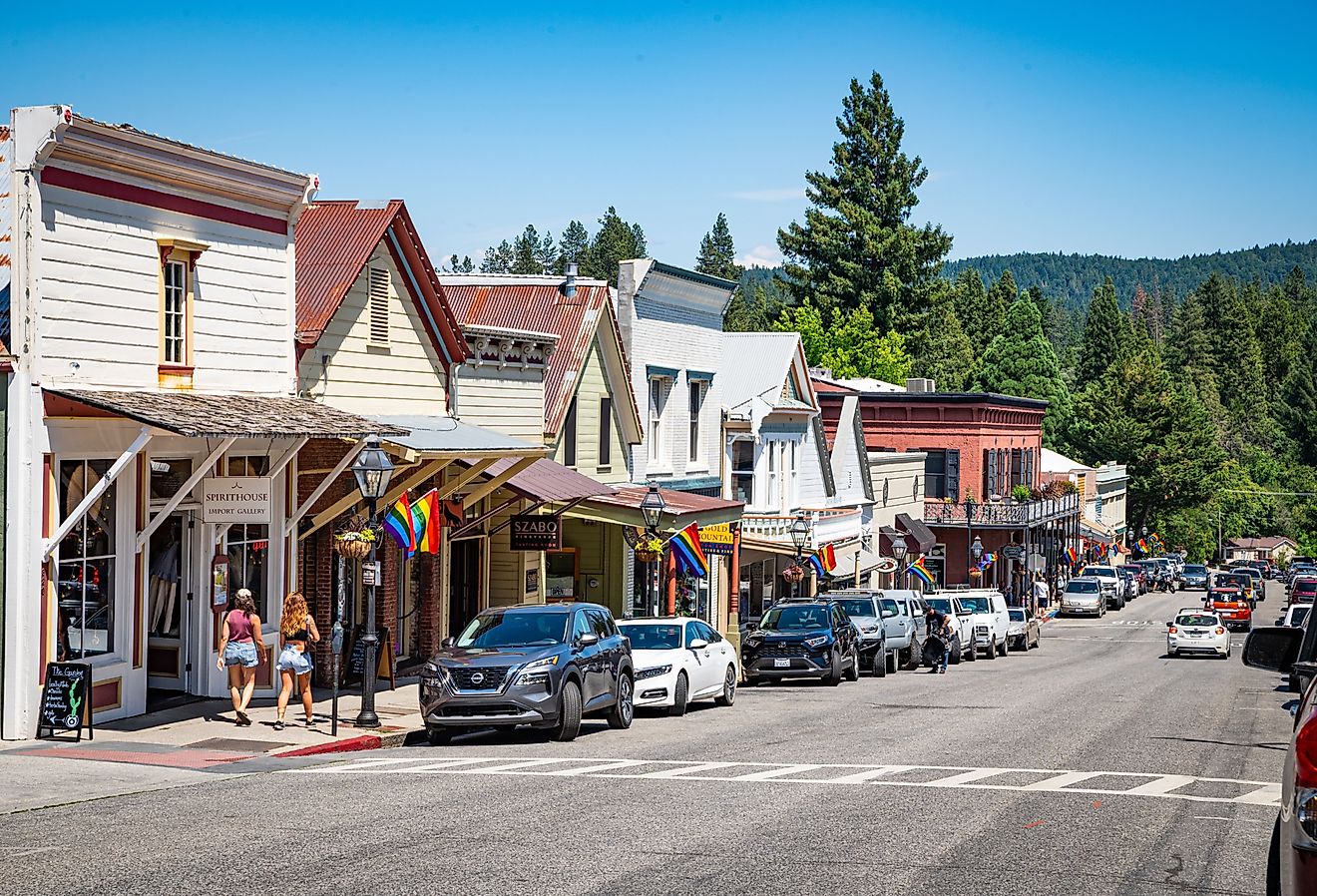 Broad Street with rainbow flags during Pride Month, Nevada City, California. Image credit Chris Allan via Shutterstock