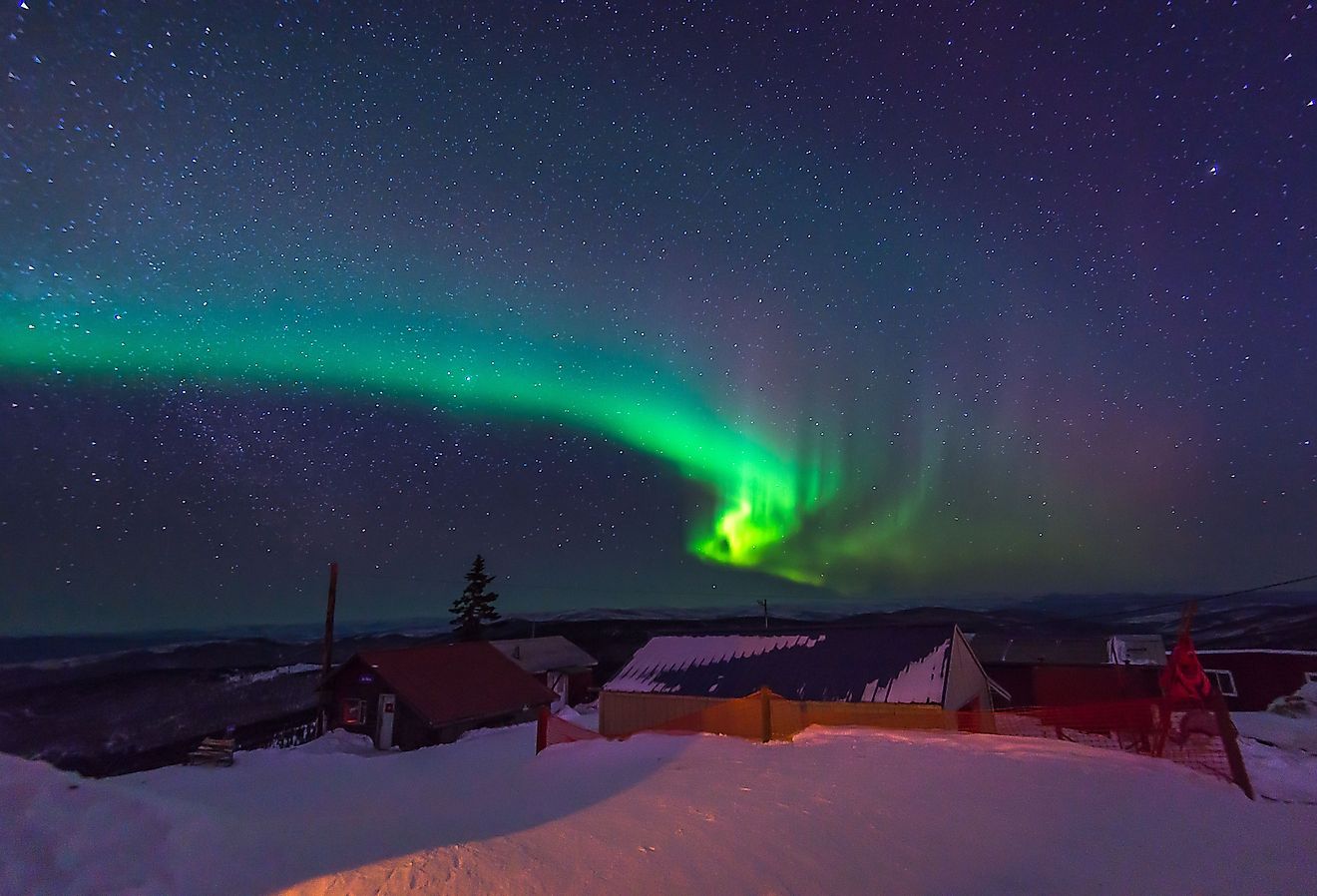 Northern lights, aurora borealis, dancing over the lovely community of Fairbanks, Alaska.