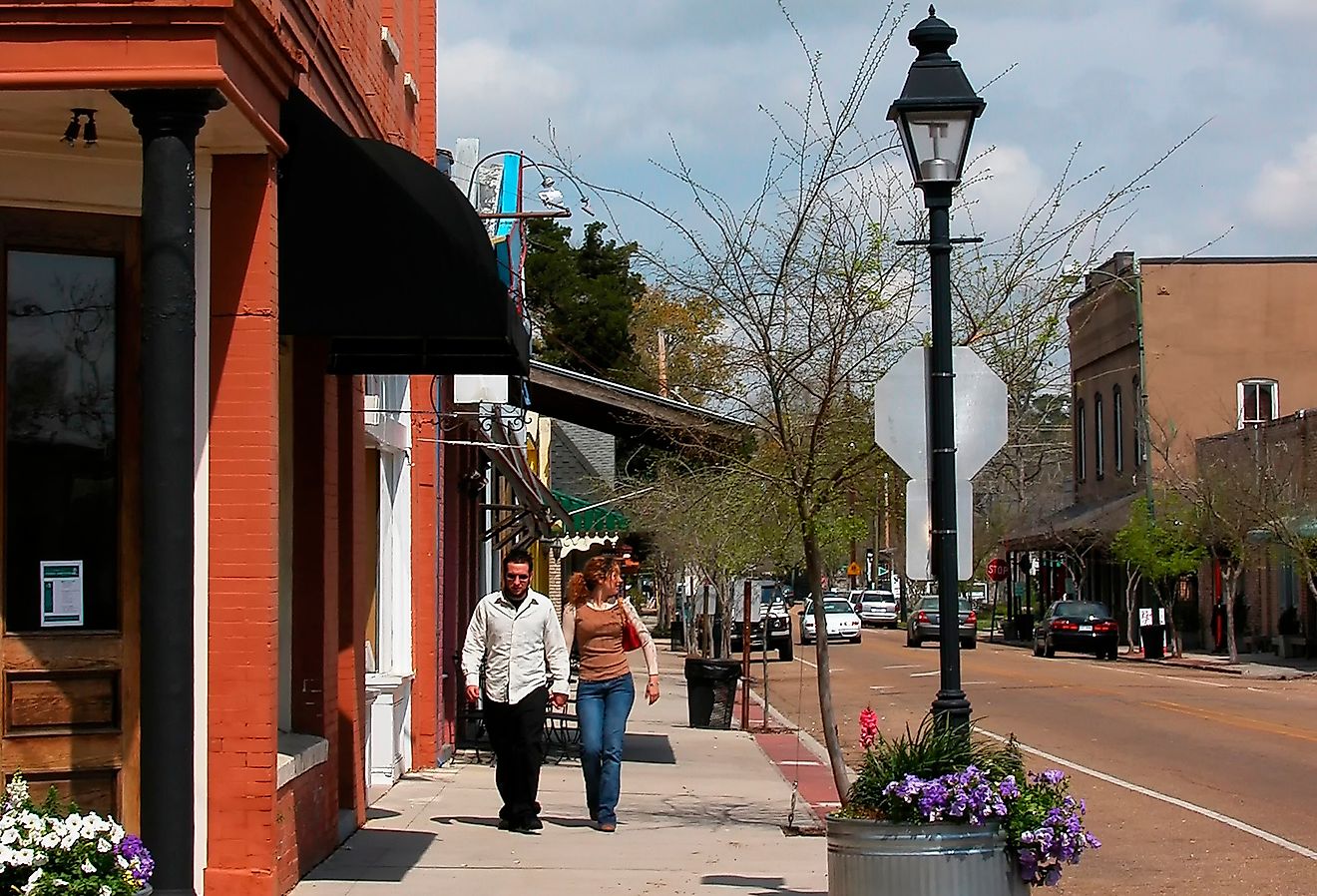 Couple strolling on Columbia Street in Covington, Louisiana. Image credit Malachi Jacobs via Shutterstock